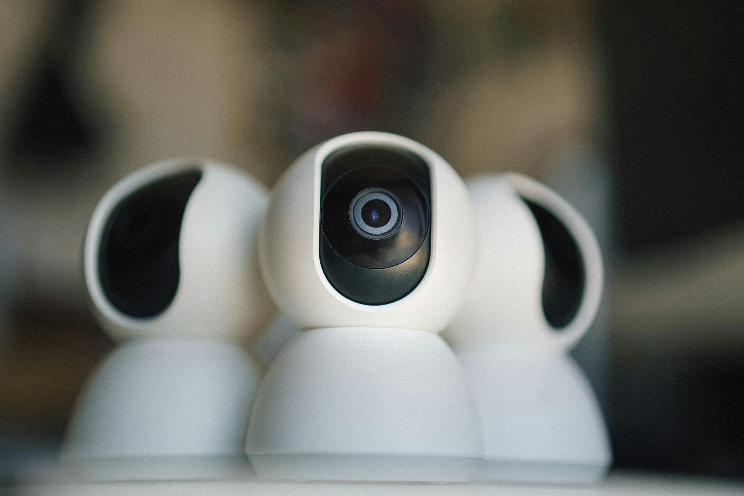 Close-up of sleek security cameras ensuring safety and privacy in indoor settings.